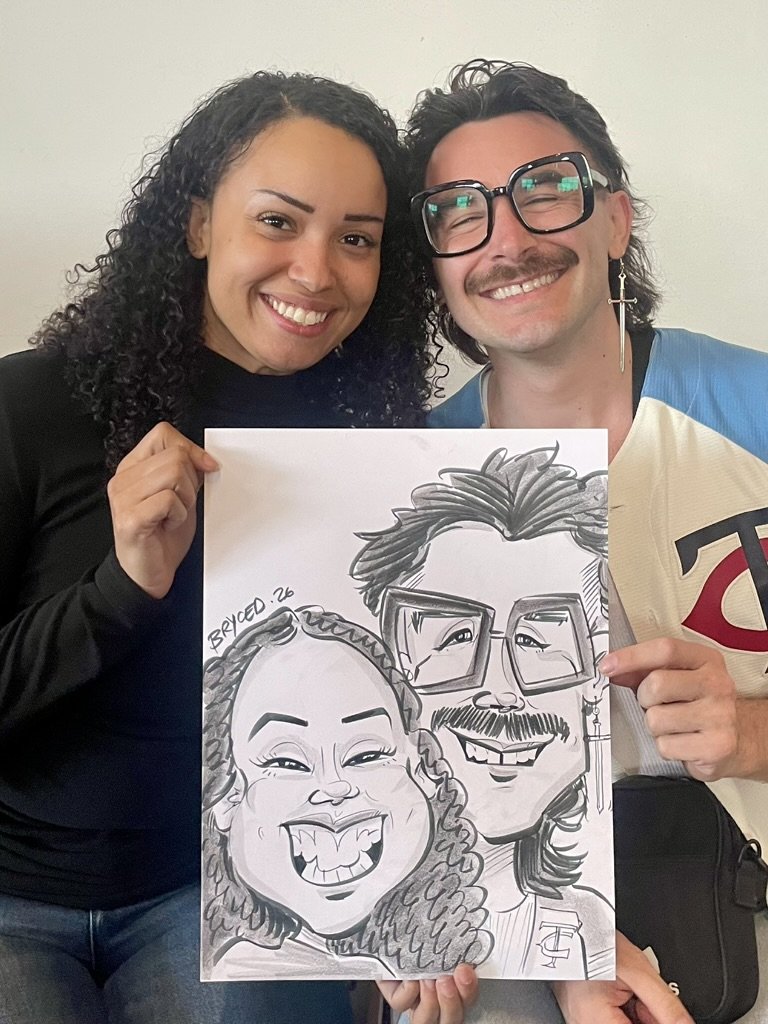 Couple posing with caricature Twin Cities MN Fundraiser event