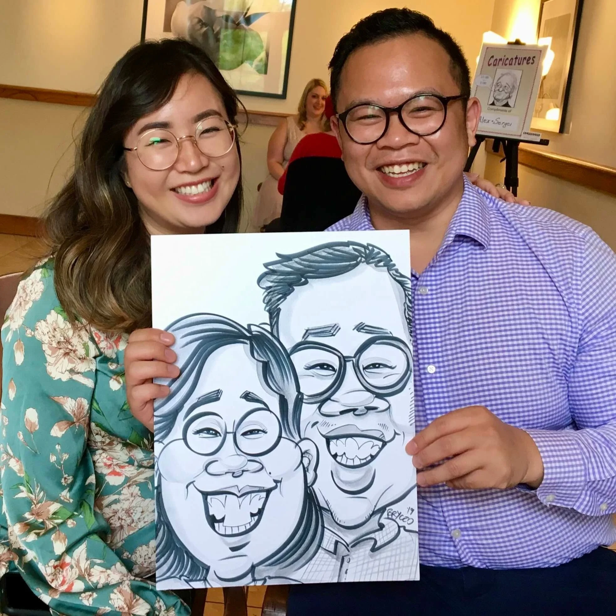 caricature artists near me event drawing Minneapolis MN party couple laughing