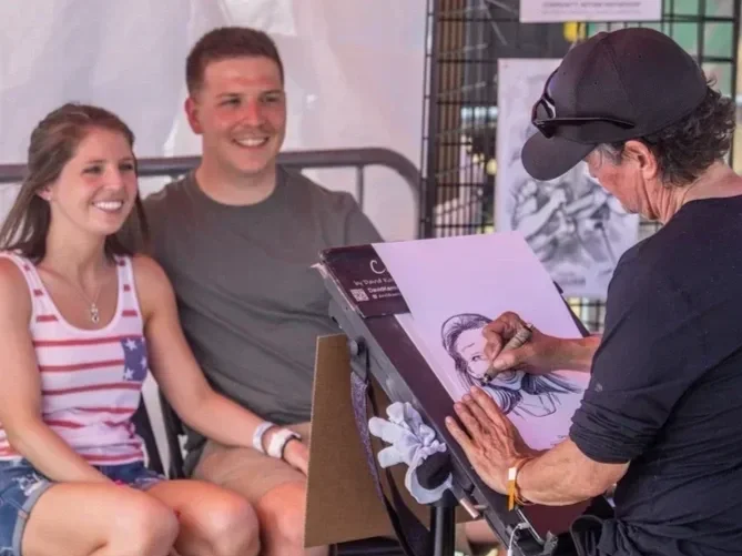 DRAWING SMILES Caricature Artist drawing caricatures Minnesota event entertainment action shot