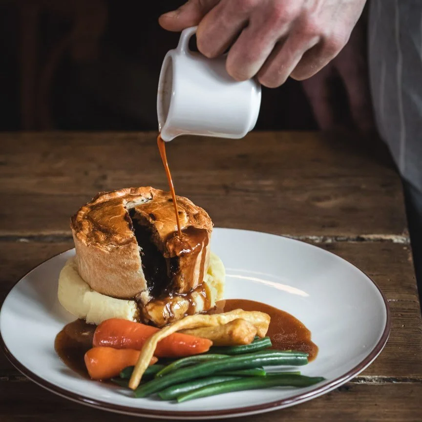 Sometimes it really is that simple.

Pie. Mash. Gravy.
A table by the fire in a bloody good British pub.

No foam, no fuss ⚔️