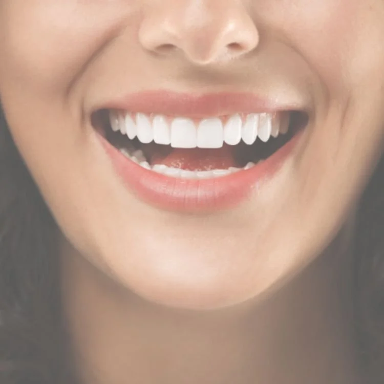 close up of a woman smiling