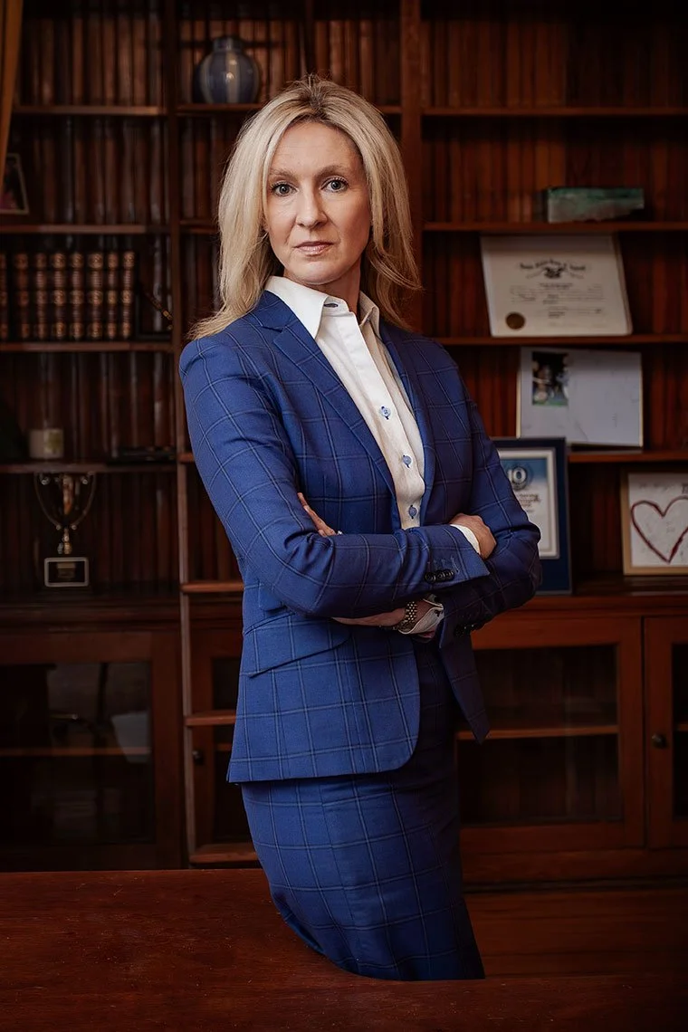 Photo of Karen Gerber standing in office