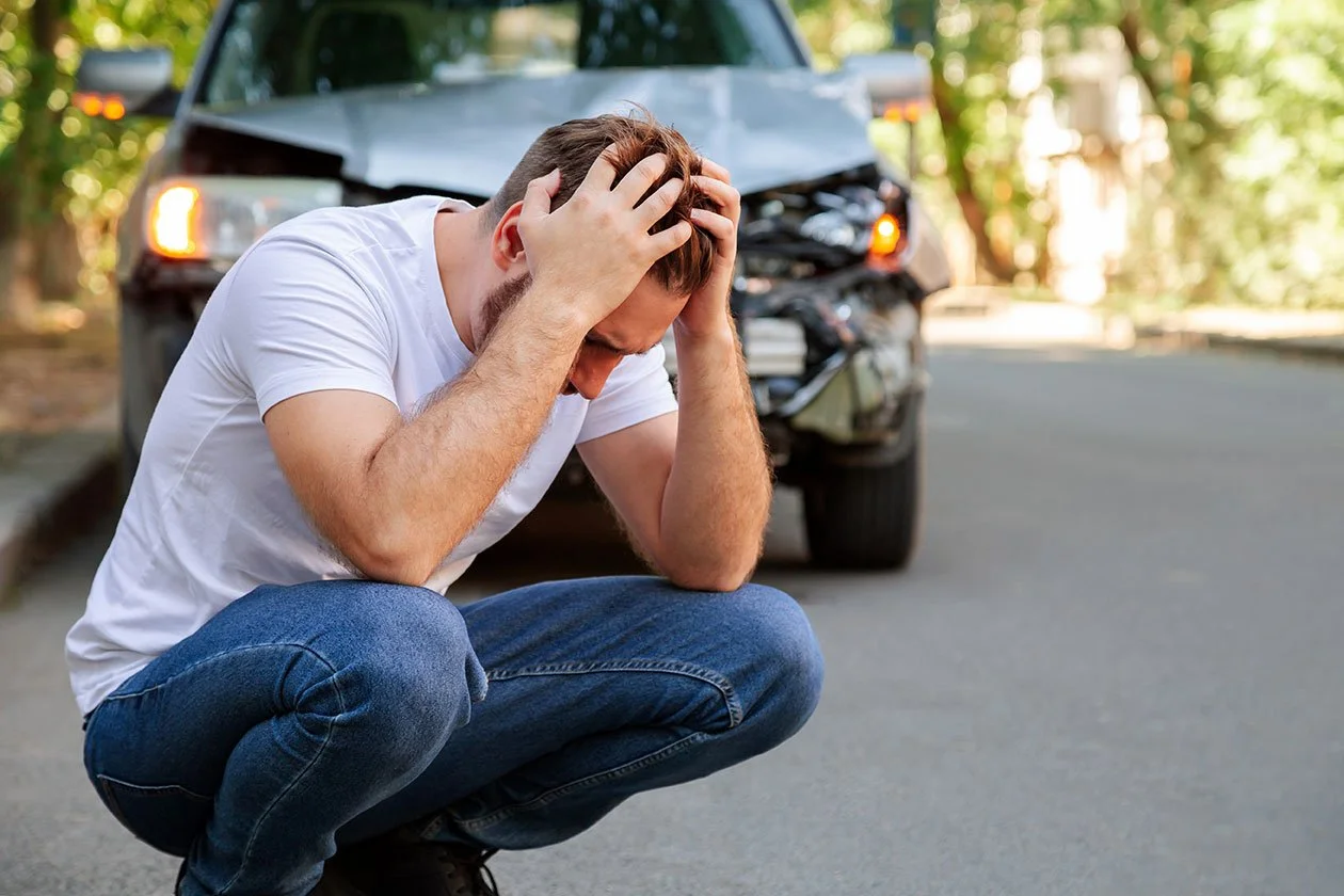 Photo of man after car accident