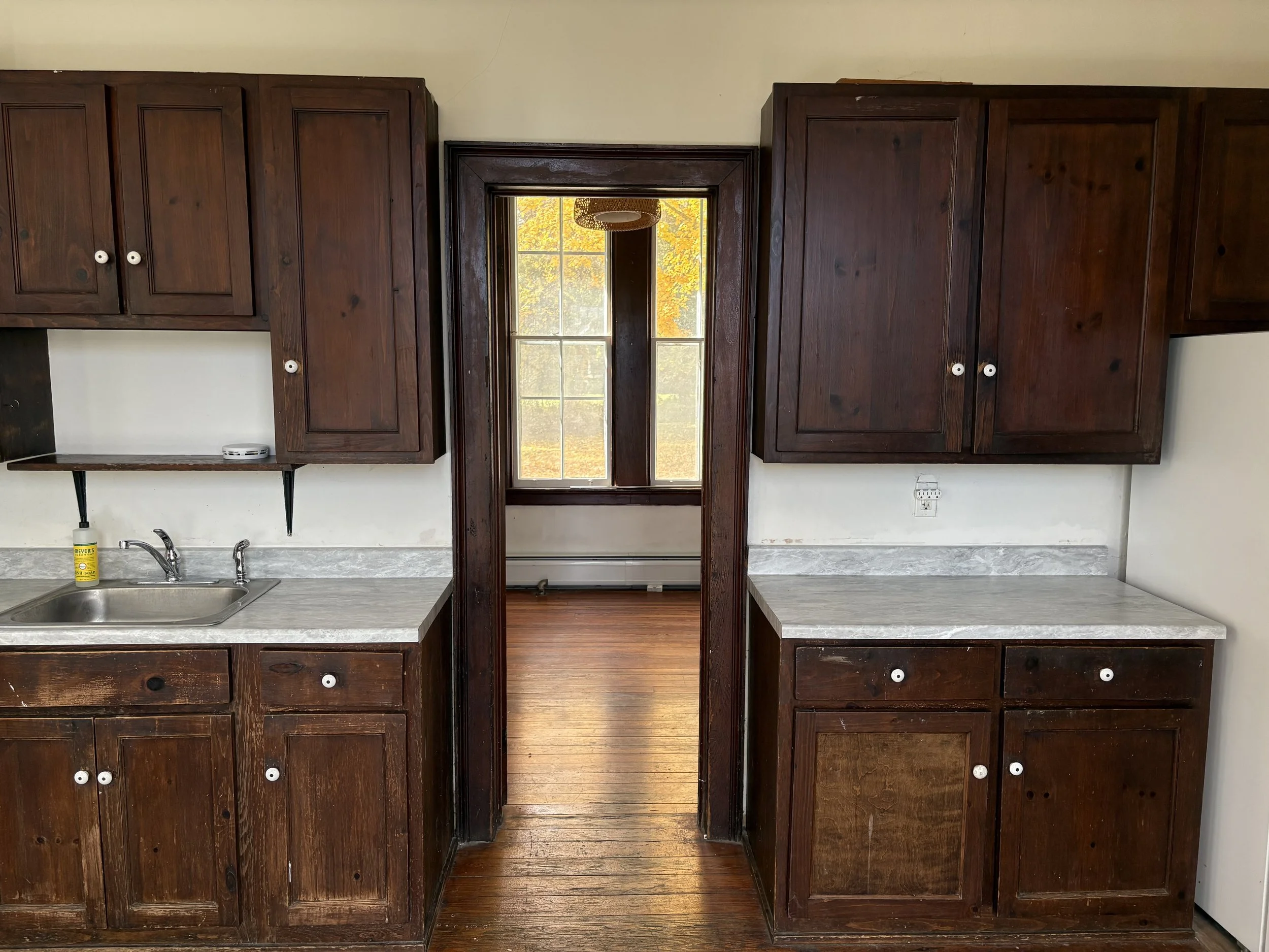 Kitchen, facing West into dining room 