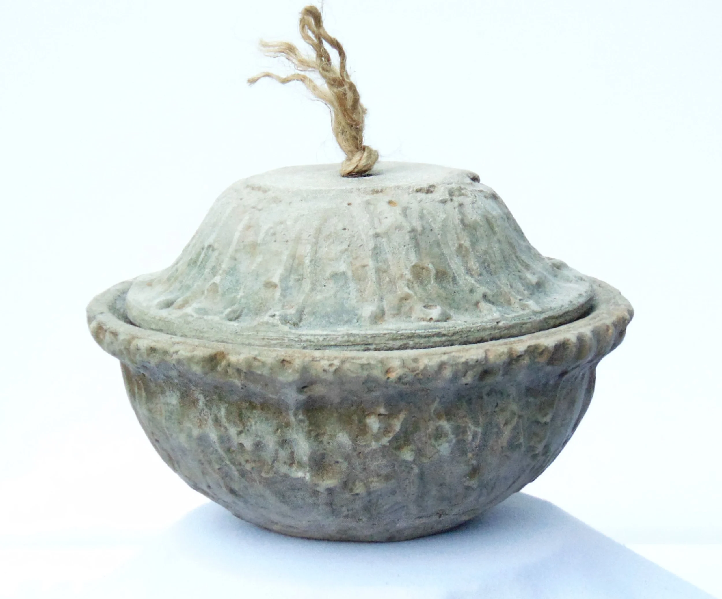 Rustic handmade stone pot with lid