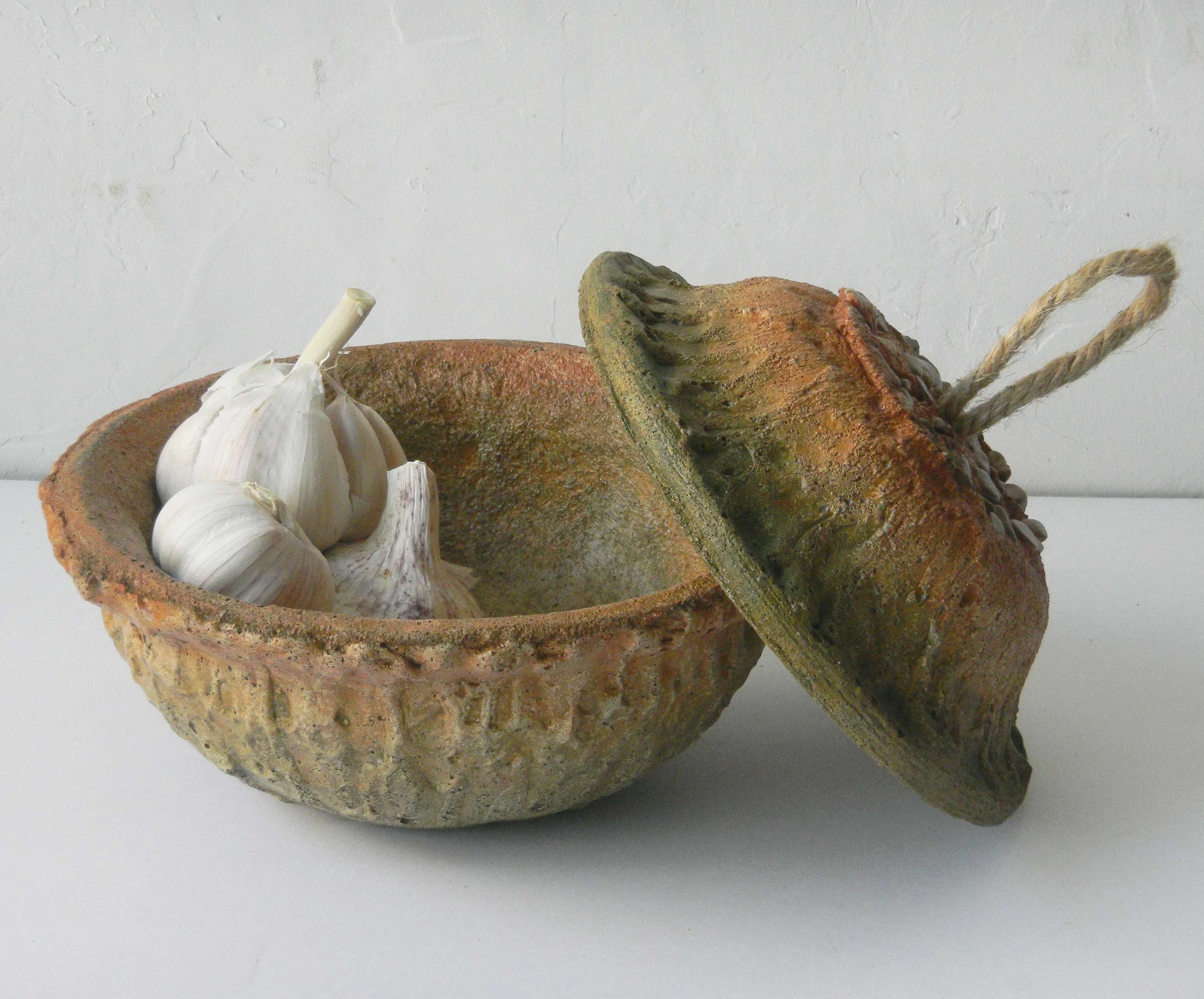 Rustic handmade stone bowl with lid