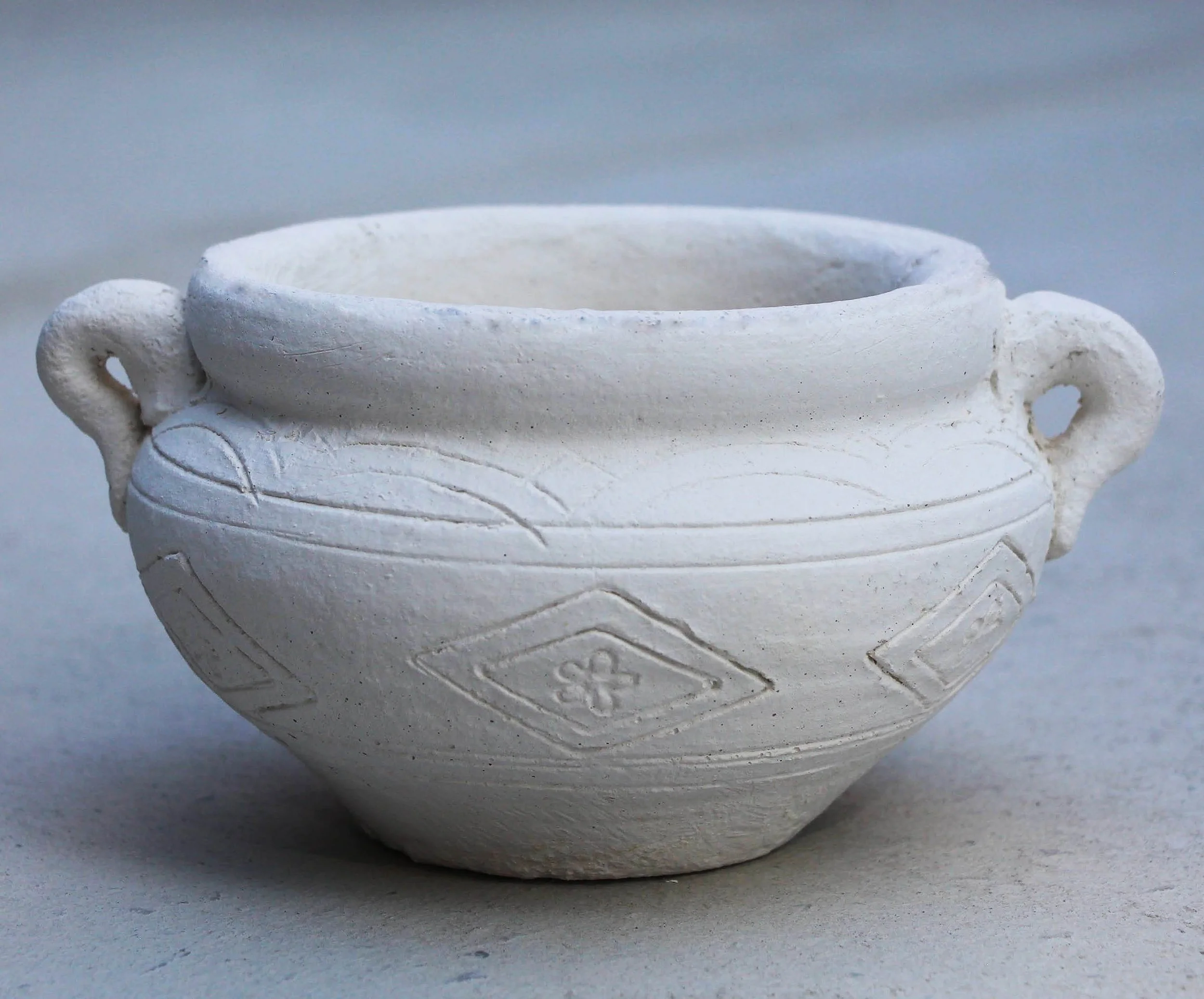 white stone small pot