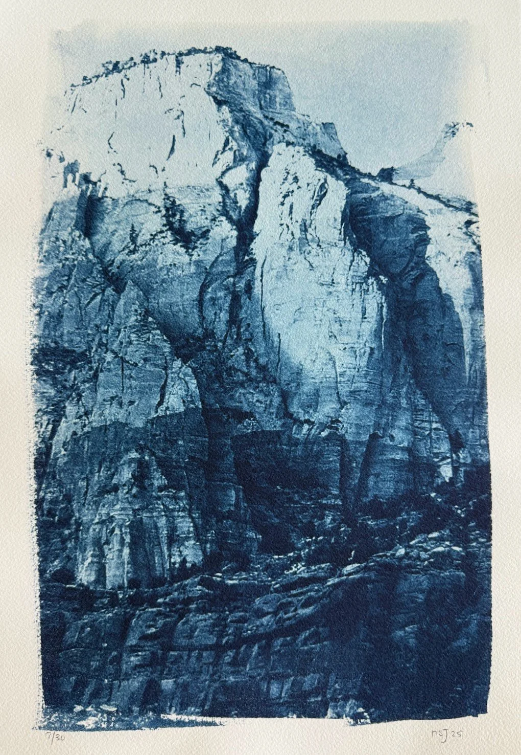Black and white landscape art of a rugged mountain with steep cliffs and rocky textures.