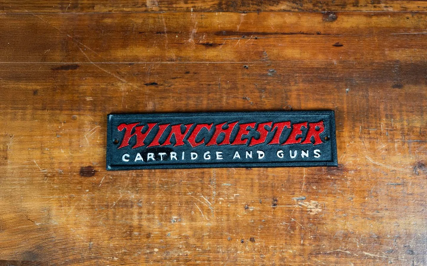 Vintage Winchester Cast Iron Sign