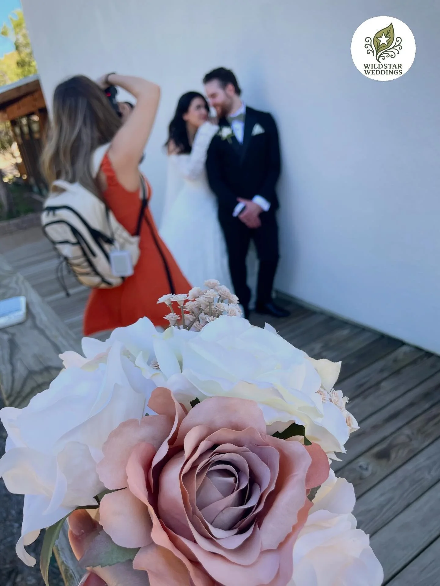 The dress is doing its full dramatic sweep.

Underneath it, slides. 😎

Because no one is looking at your feet
and you might as well be comfortable.

That&rsquo;s Chapel Dulcinea.

Big view. Big moment.
Then a short walk down the path like
okay, back