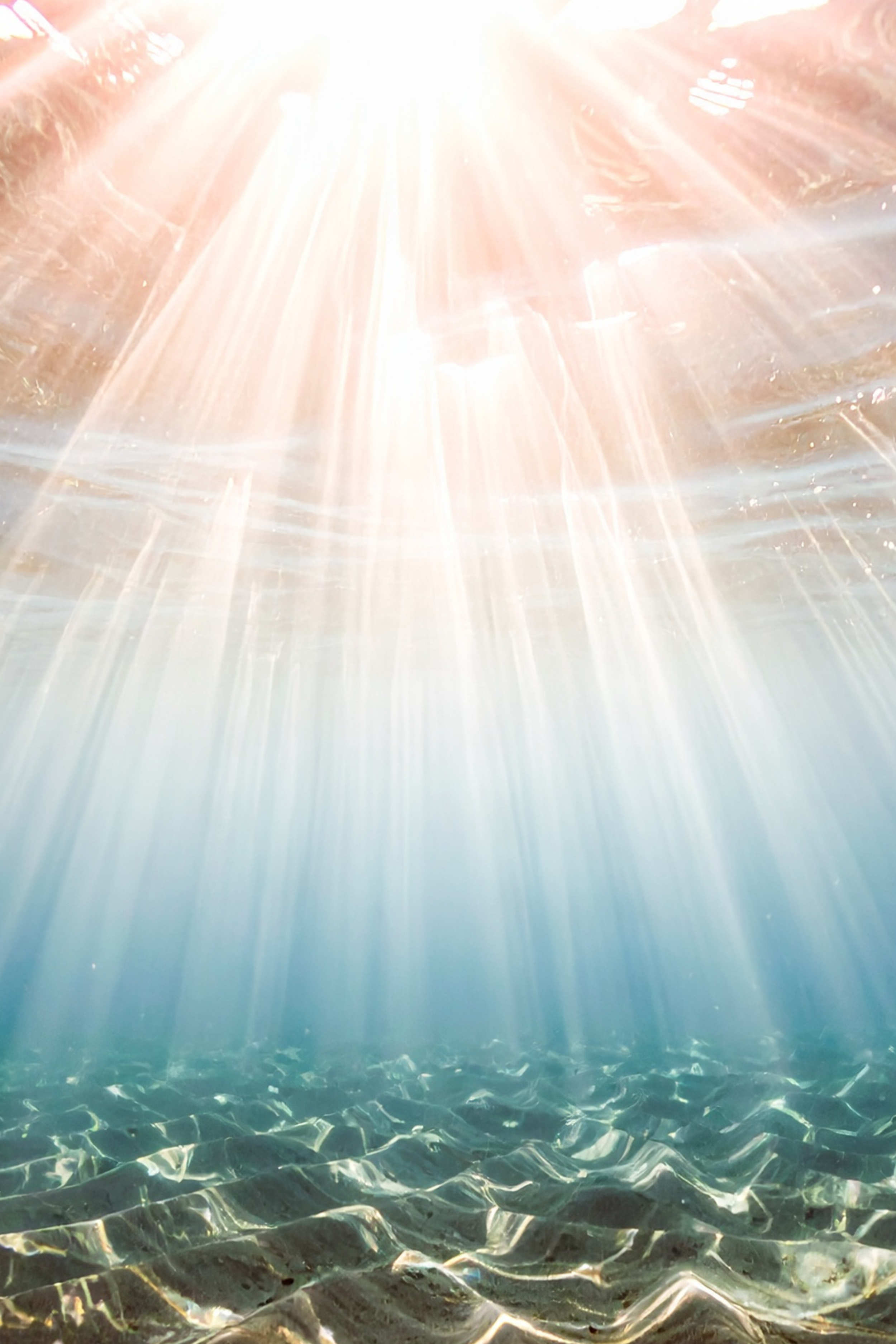 Sunlight shines through the water's surface mirroring the feeling one might experience when being treated with oral ketamine.