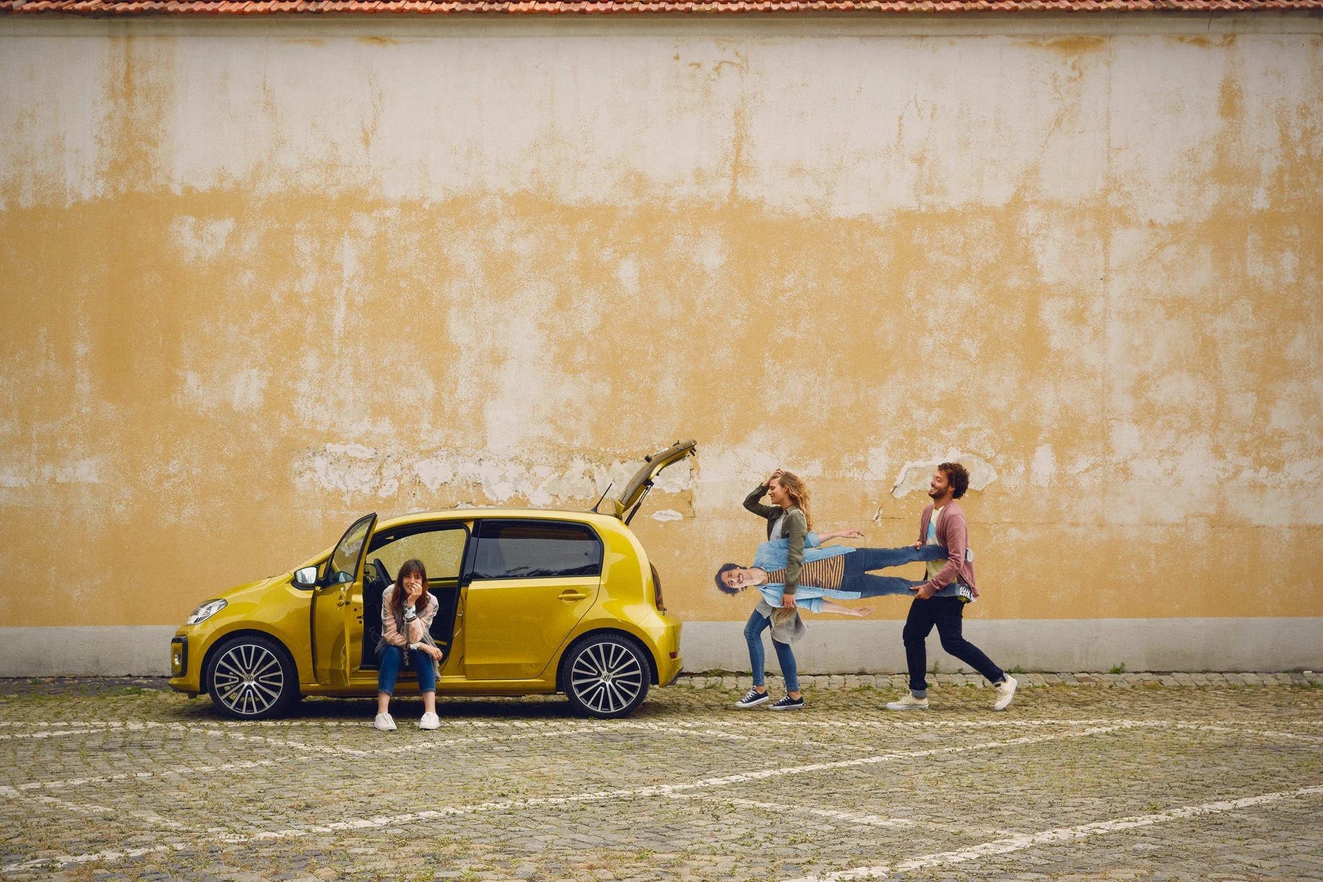 Campaign visual for the VW up! digital campaign showcasing the compact car’s versatility and customization through a playful, lifestyle-driven setting.