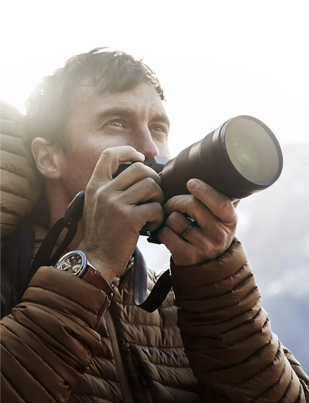 Campaign image from Montblanc’s “The Spirit of Exploration” featuring outdoor filmmaker and photographer Chris Burkard, capturing the essence of adventure and discovery for the 1858 watch collection.