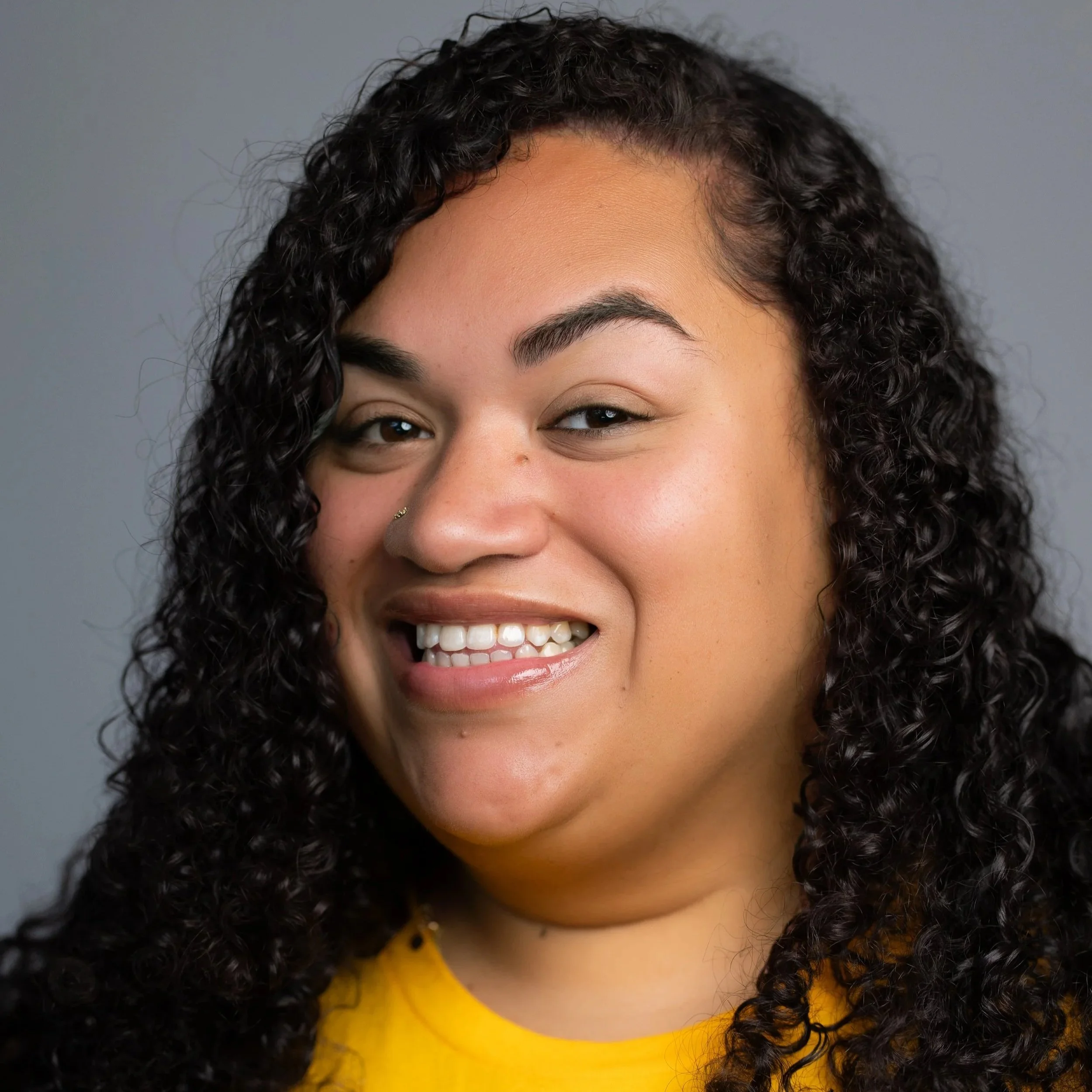 Headshot of Dominique Malone