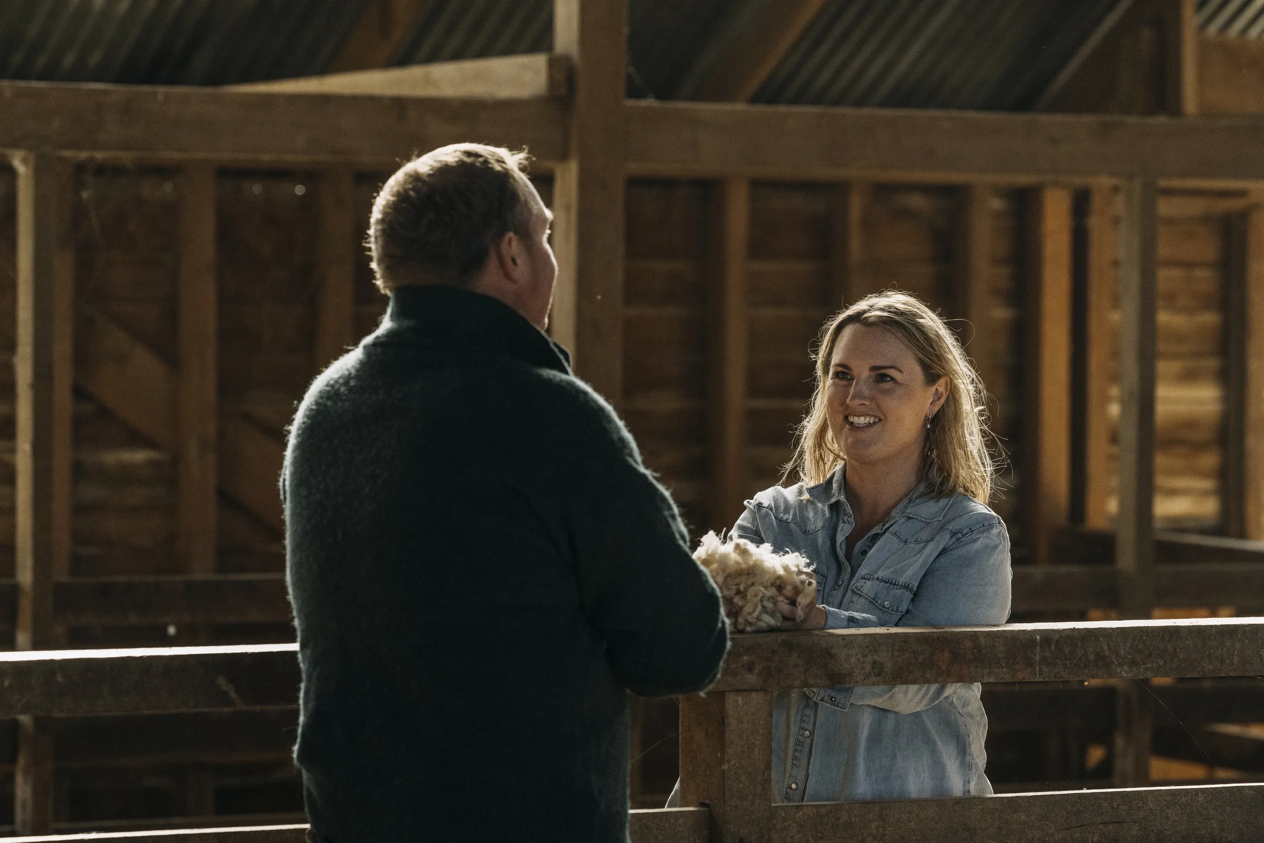 Lily McKimm talks with an Akitio farmer about the wool produced by Big Wool for premium, sustainable, innovative and new furniture manufacturing in new zealand,nz