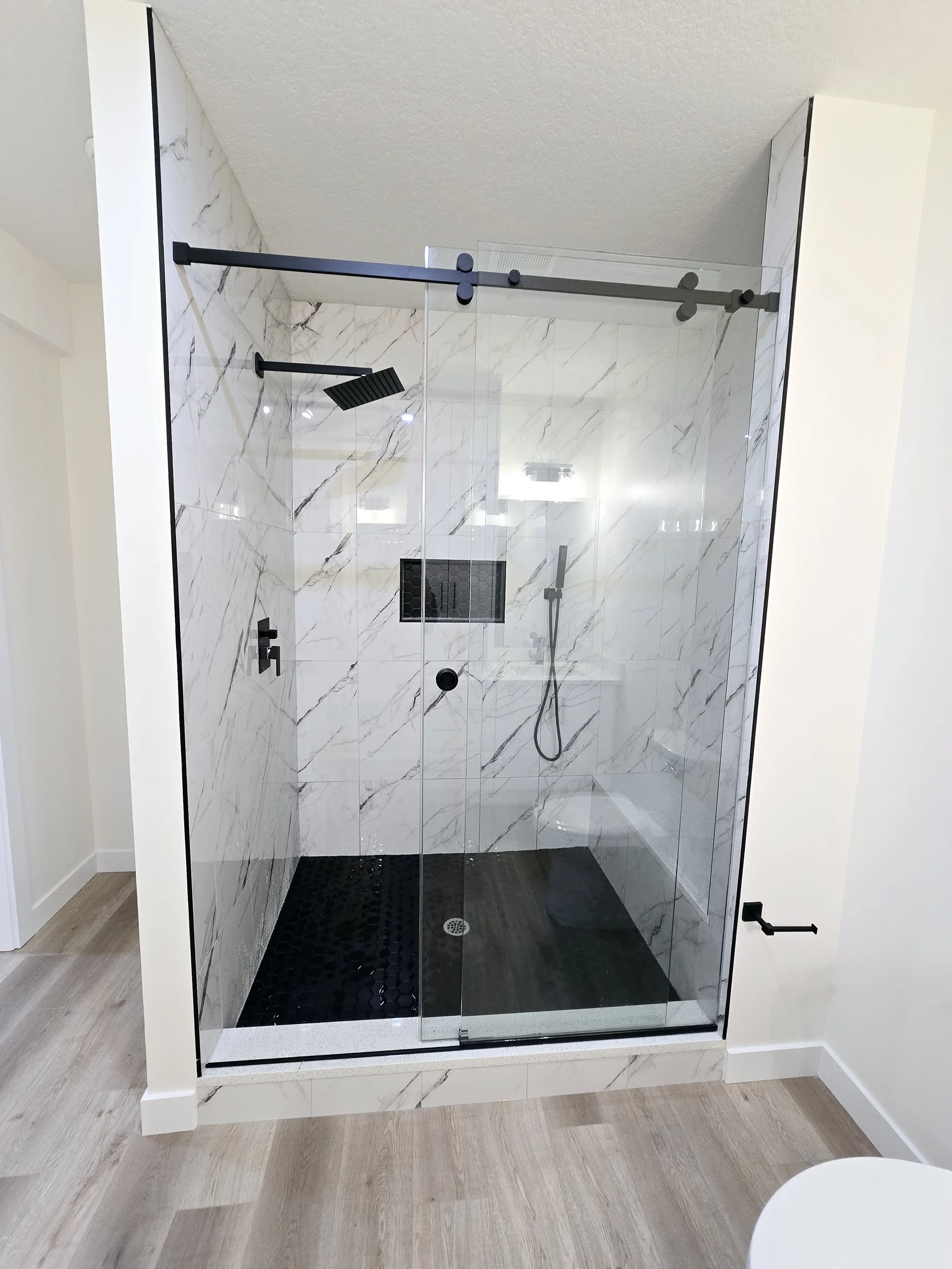 calgary-legal-basement-suite-bathroom-glass-walk-in-shower.jpg