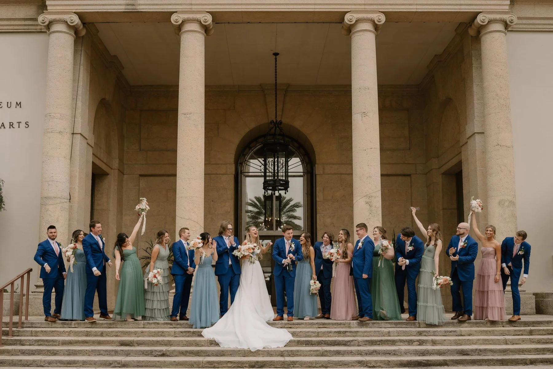 wedding couple on steps of museum of fine arts in st. pete
