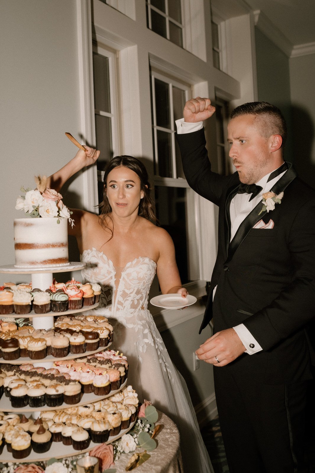 fun cake cutting photo at fenway hotel in dunedin florida