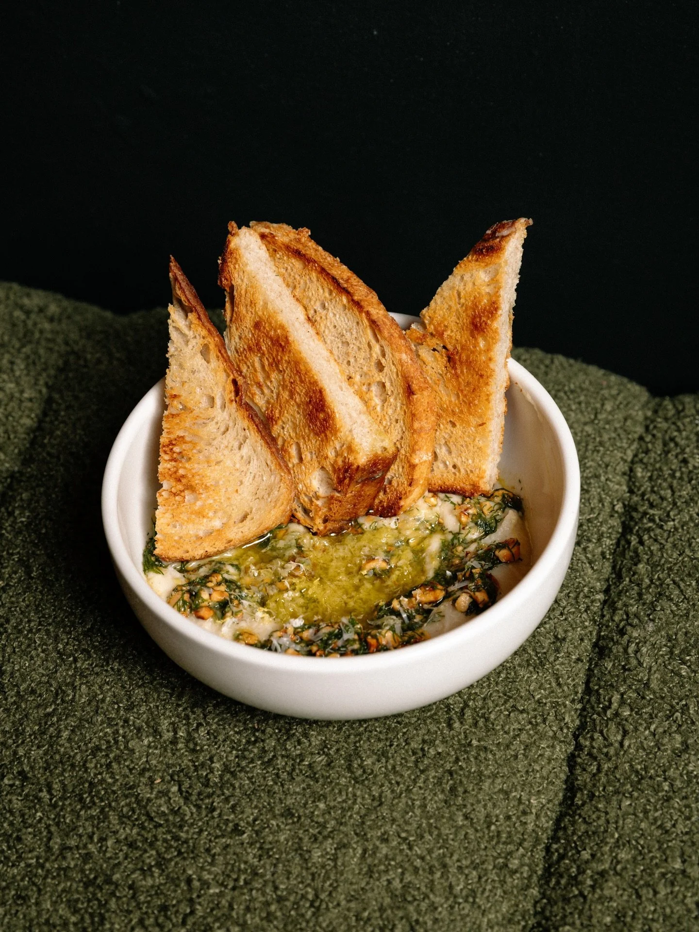 Great games deserve great bites. White bean dip with miso, lemon, hazelnuts, dill &amp; toast.