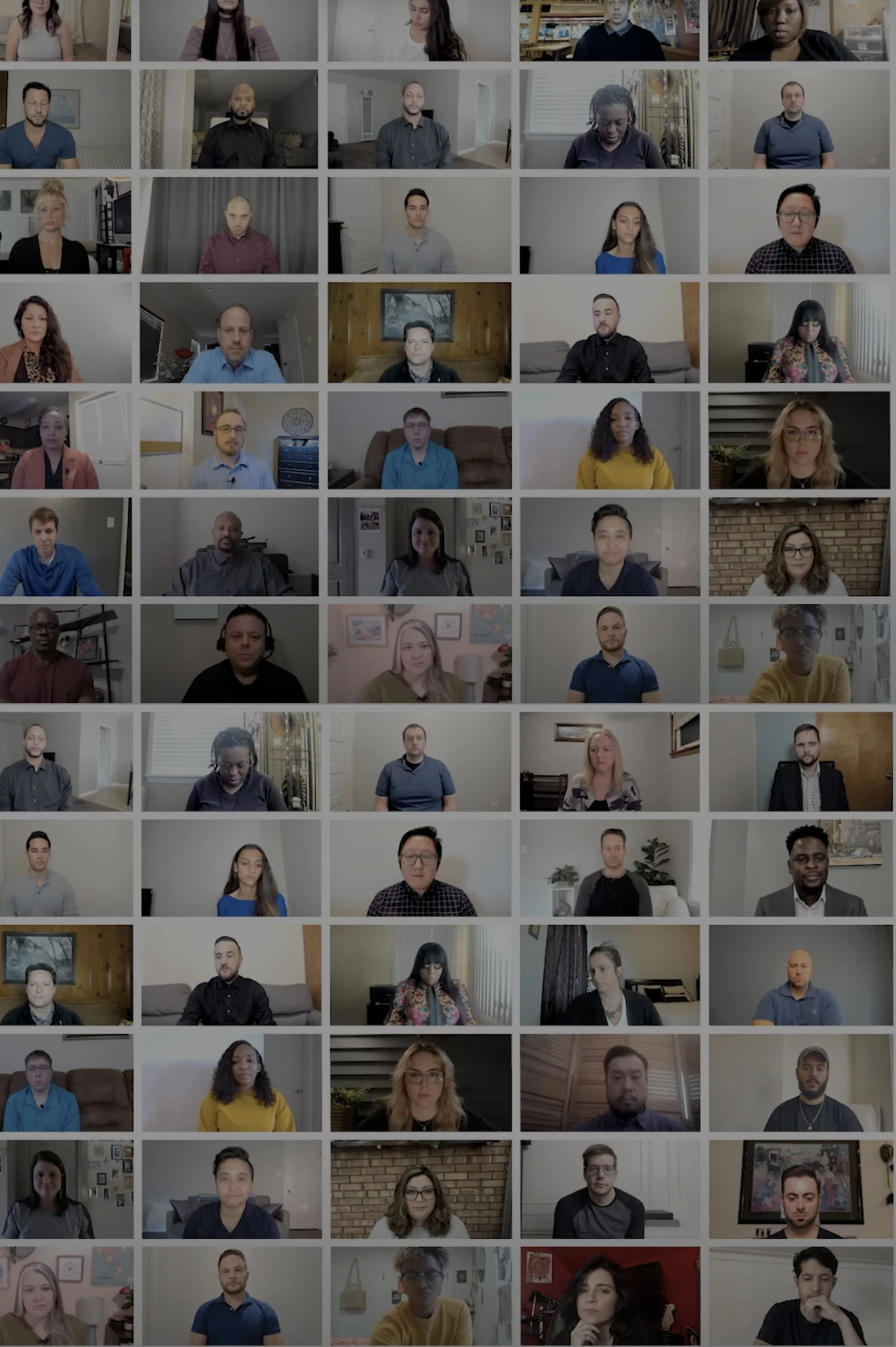 Multiple people participating in a virtual video conference call, each in their own separate video frame.