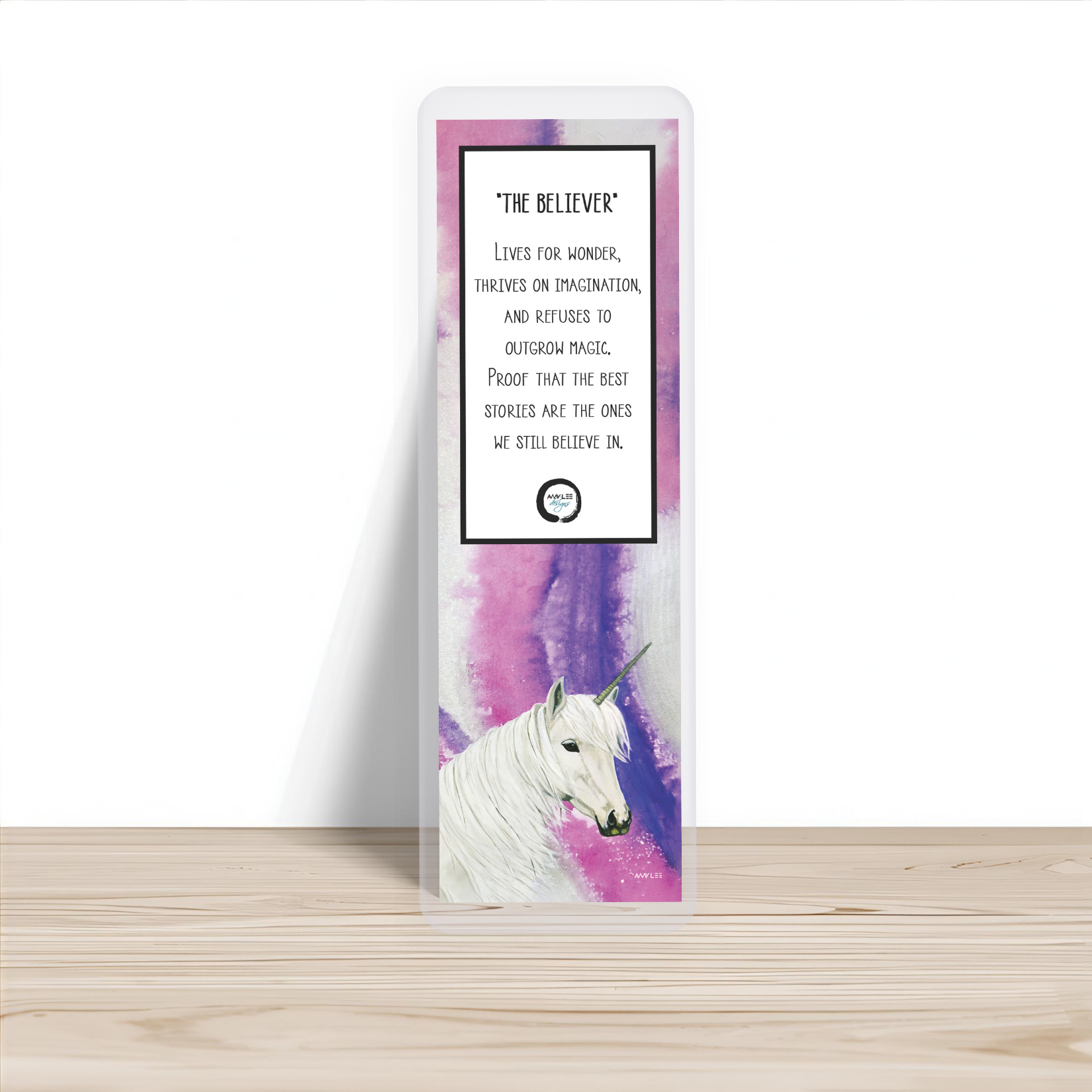 Unicorn_Bookmark_Single, Wooden table.png