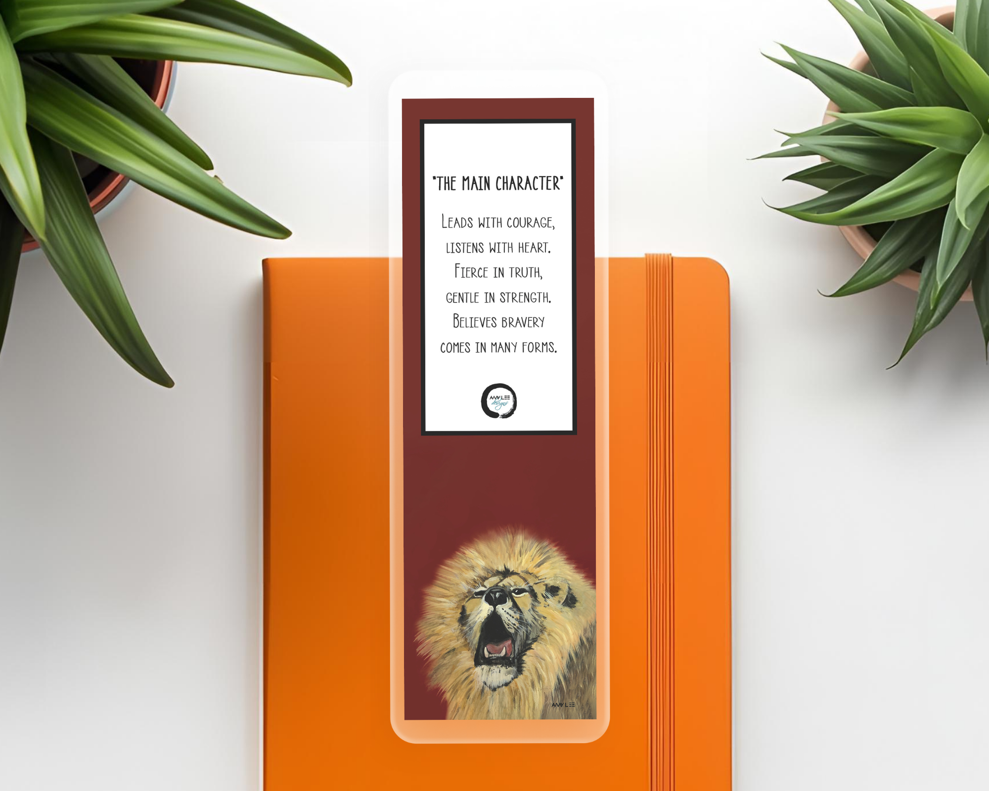 Lion_Bookmark  on orange  journal Mockup-3.png