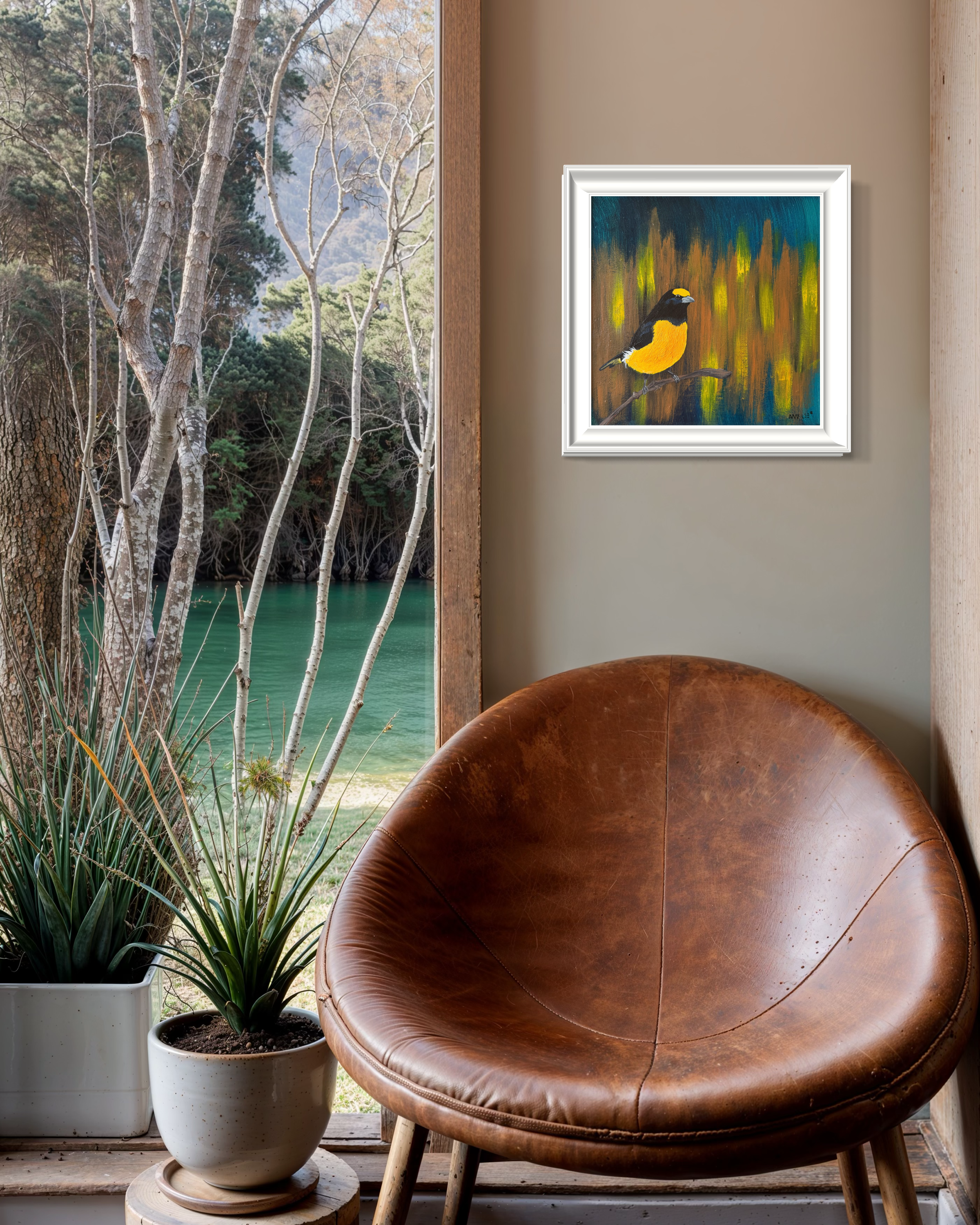 Bright bird painting adding warmth and color to neutral space