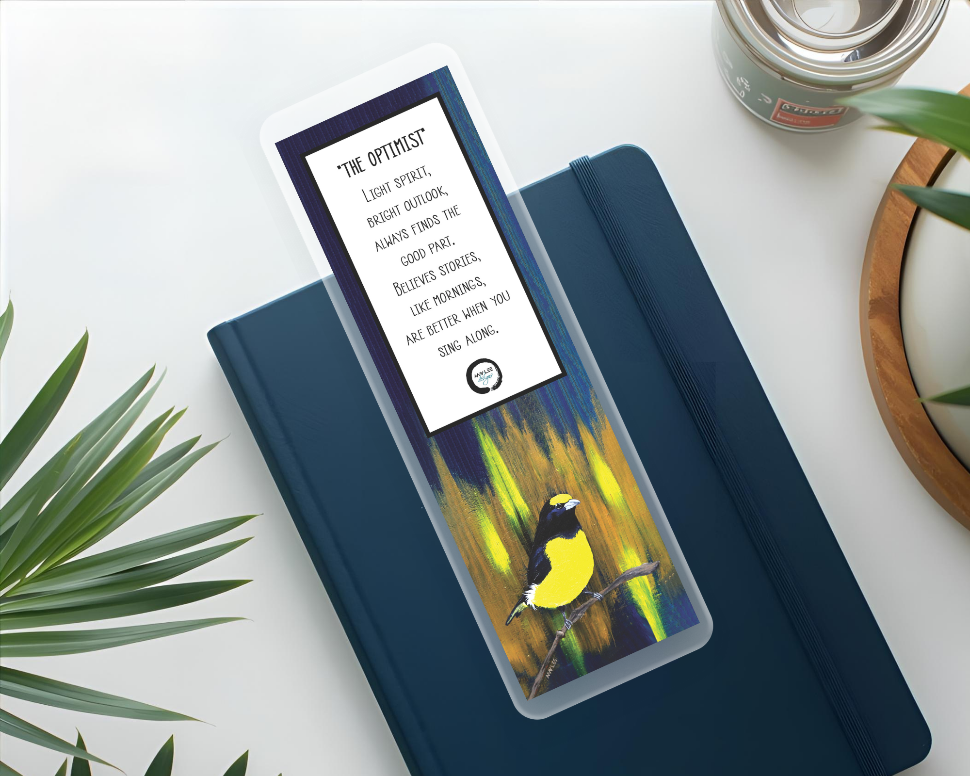Yellow bird_Bookmark  on navy journal Mockup.png