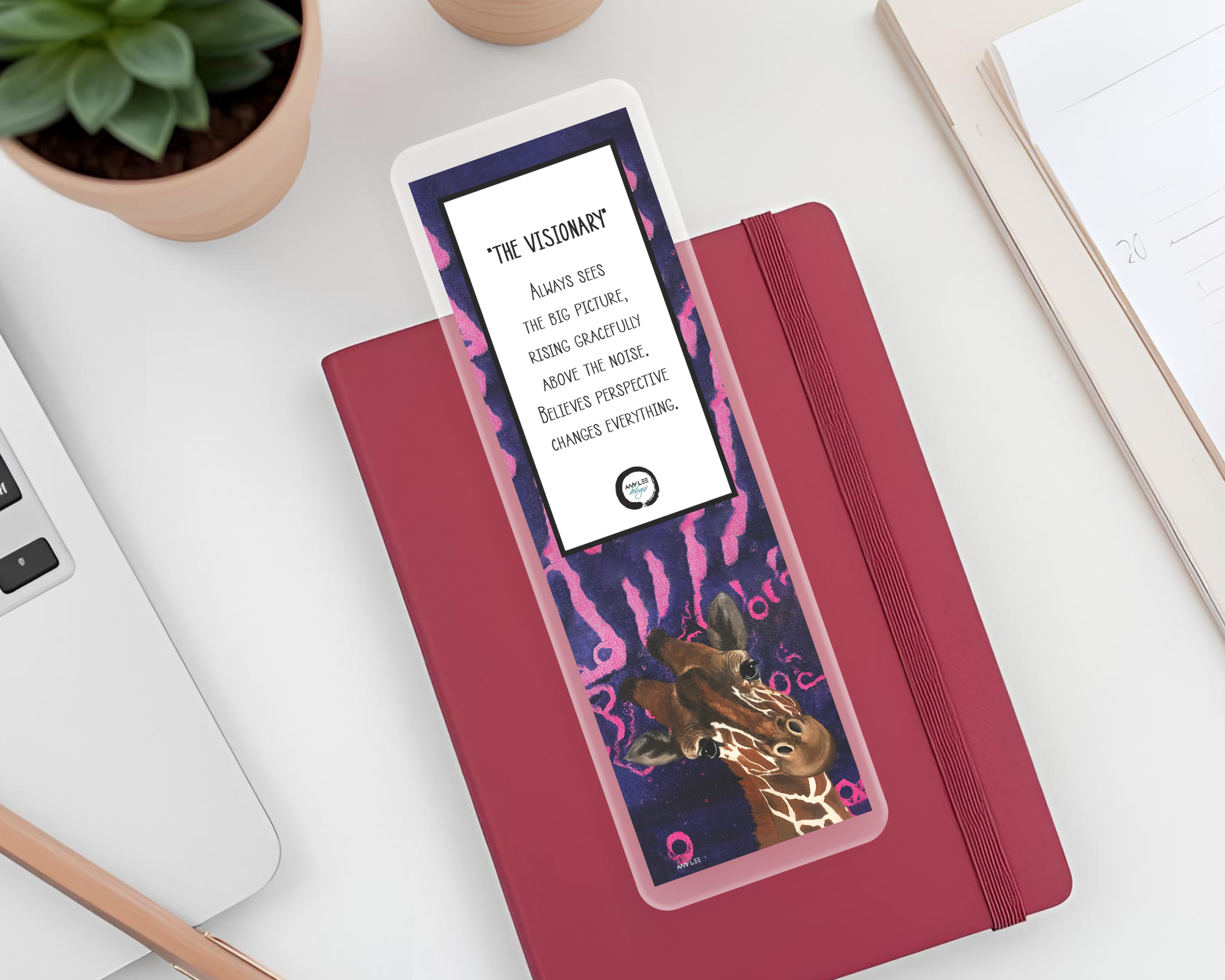 Navy Pink Giraffe_Visionary_Bookmark  on dark pink journal Mockup.png