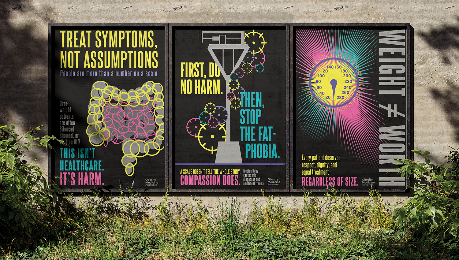 Three posters promoting healthcare awareness mounted on a wall outdoors, with green plants and grass at the bottom. The first poster emphasizes treating symptoms not assumptions with a graphic of a stomach made of circles and a message about harm from weight bias. The second poster advises first doing no harm and stopping fat phobia, featuring a graphic of a scale and gears, with a message about compassion. The third poster advocates for respect and equal treatment regardless of size, showcasing a colorful gauge and message about dignity.