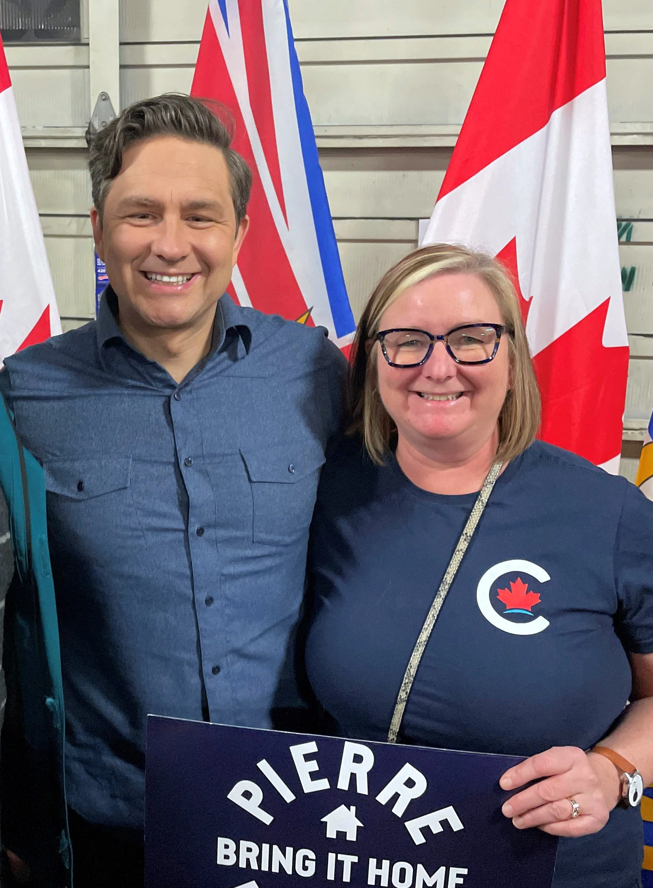 Leslie Koole with Pierre at a rally