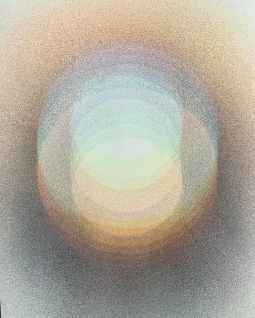 Abstract image with layered, circular shapes in pastel colors, creating a concentric pattern.