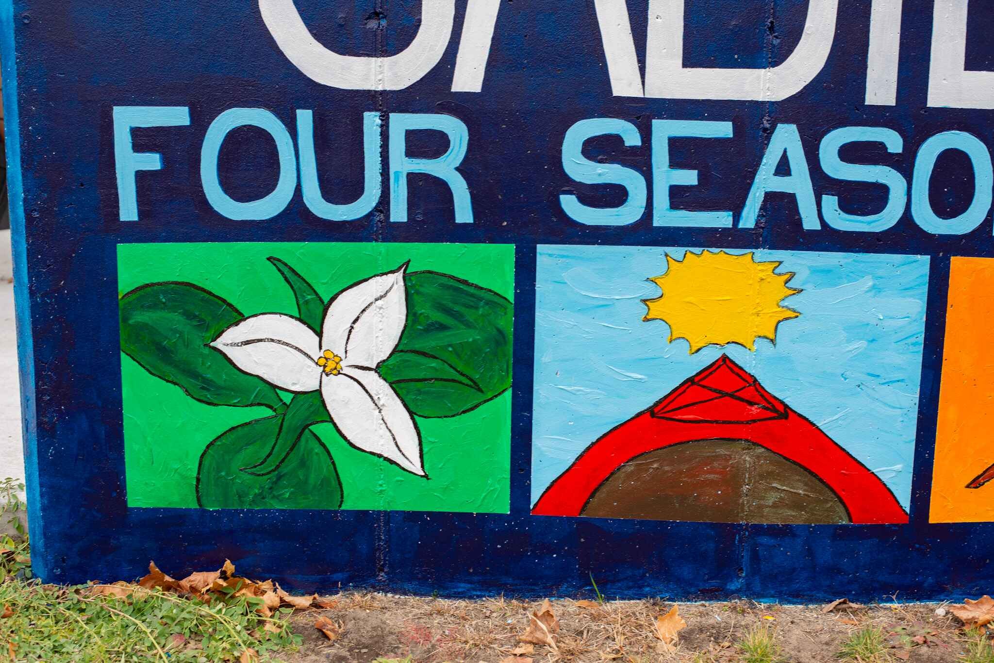 Cadillac, Michigan, welcome sign mural closeup.