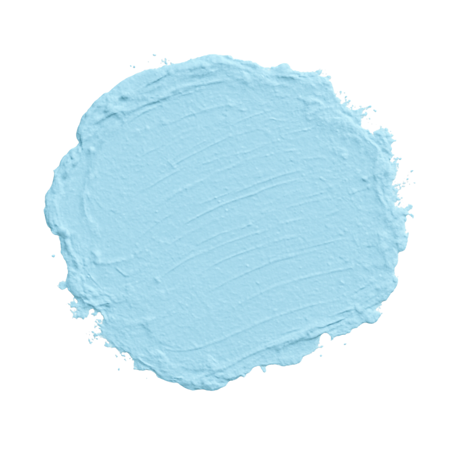 A close-up of a round object with a textured light blue surface.