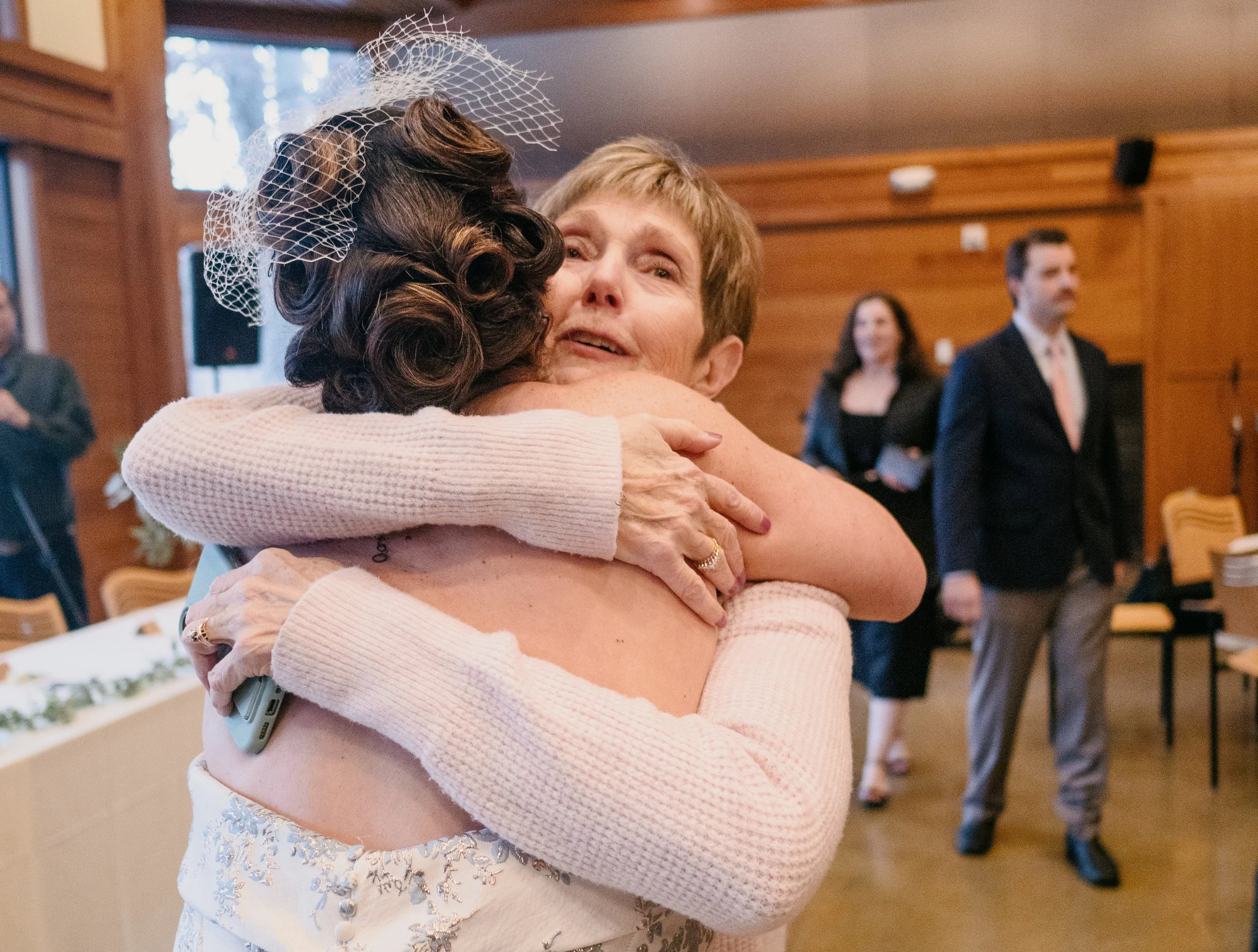 Candid reception moment at Hamil and Vanessa's winter wedding — Silverwood Park, Minneapolis, MN, photographed by Madeline H Nelson
