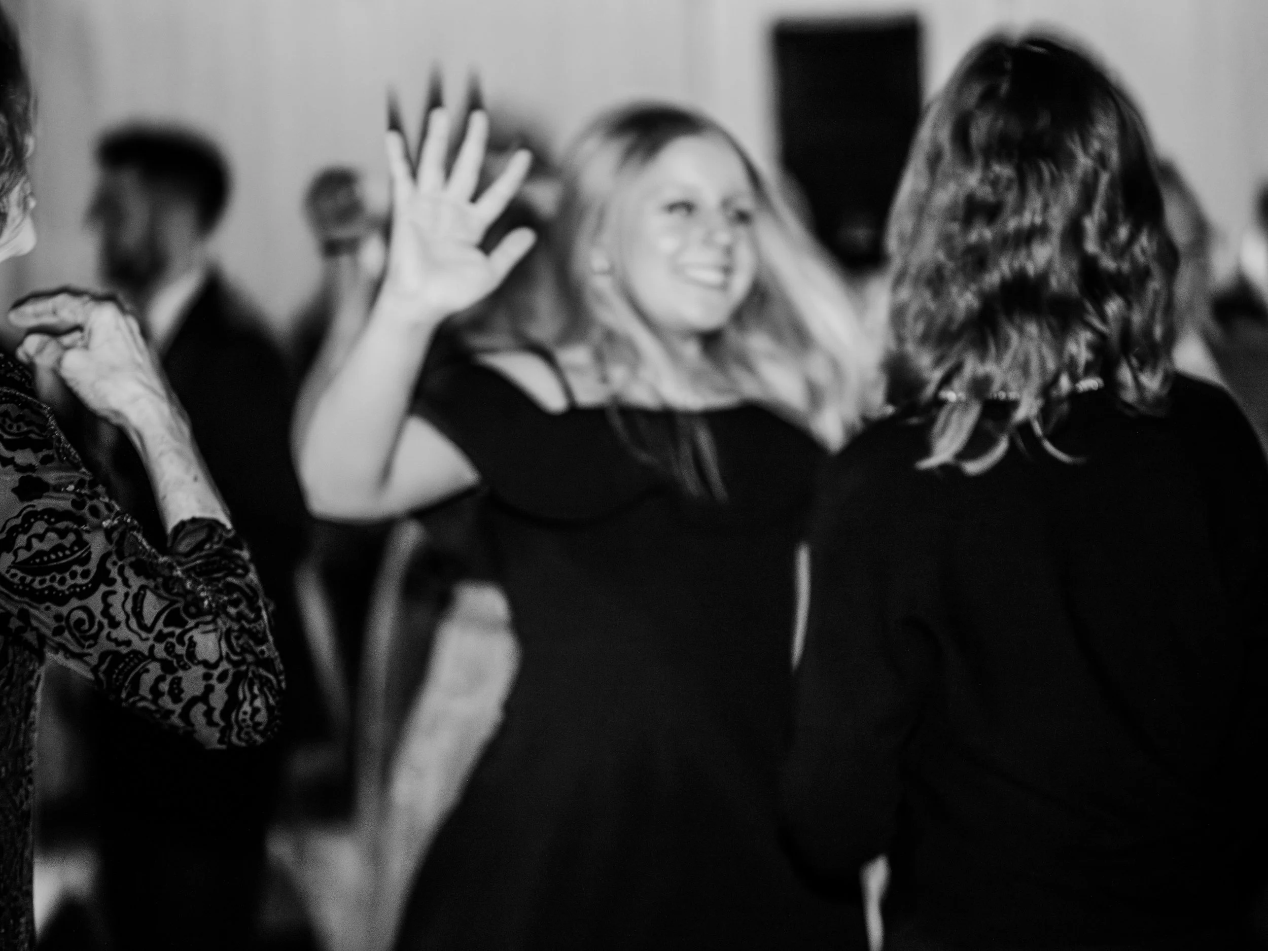 Joyful reception dancing photo from a formal winter wedding at Silverwood Park — Minneapolis wedding photography by Madeline H Nelson