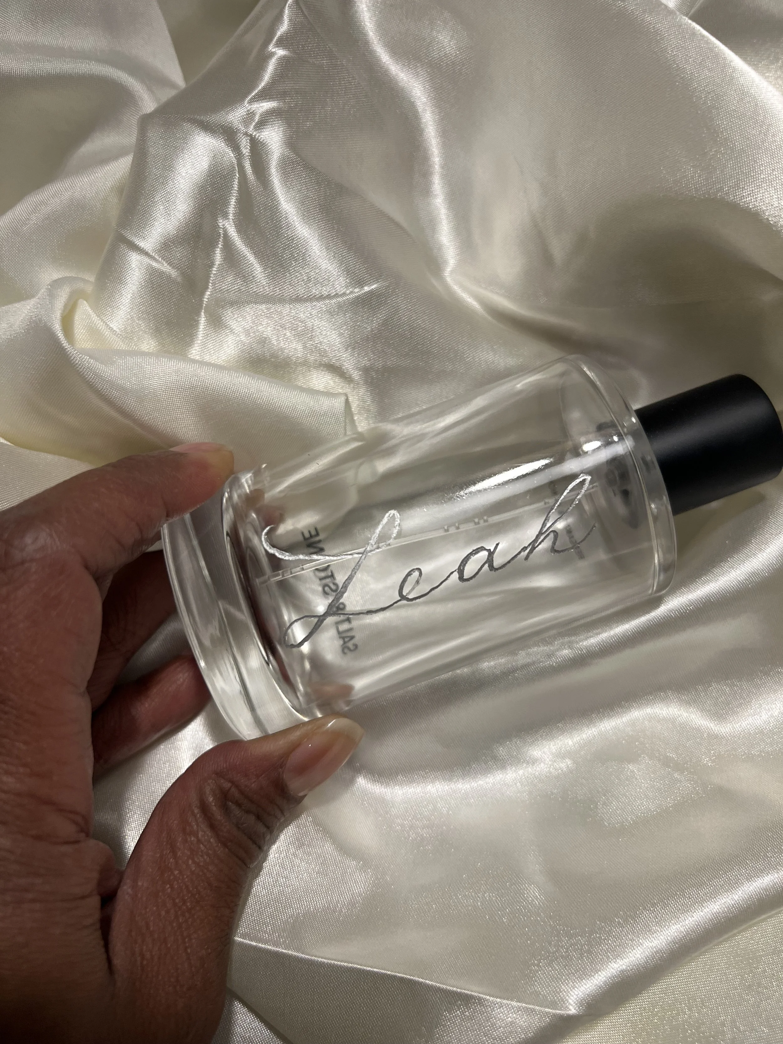 engraved, luxury perfume bottle