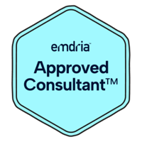 Emdira Approved Consultant badge in a hexagon shape with blue background.