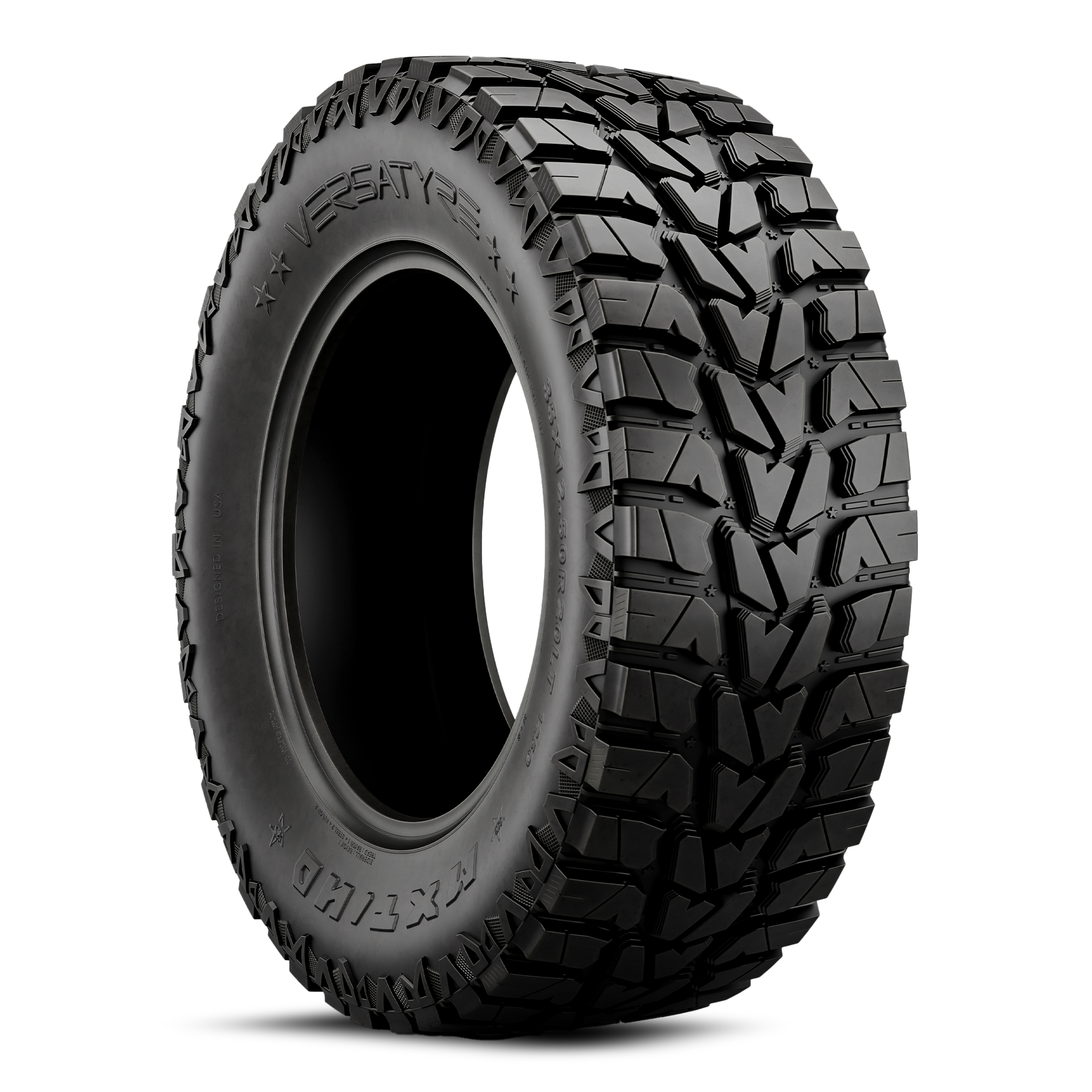 Close-up of an all-terrain tire with detailed tread pattern, mounted on a wheel, black background.
