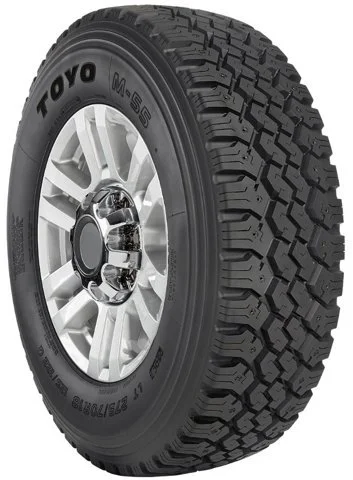 A Toyo M-55 off-road tire with a silver alloy wheel.