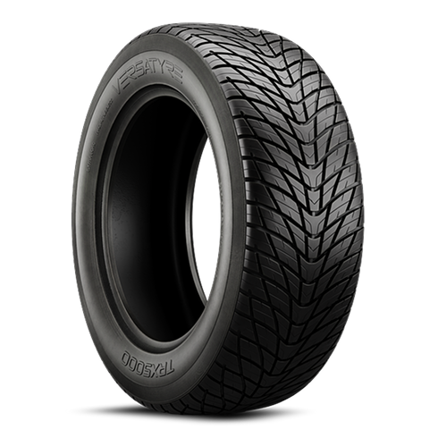 A black tire with detailed tread pattern against a black background.