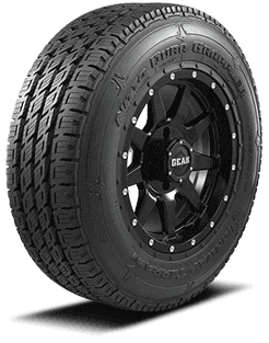 A black off-road vehicle tire with a rugged tread pattern and black alloy wheel with multiple spokes and bead lock design.