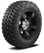 Close-up of a rugged off-road tire and black wheel rim