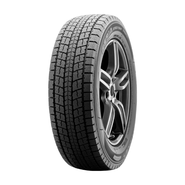 A car tire with detailed tread pattern mounted on a rim, isolated on a black background.