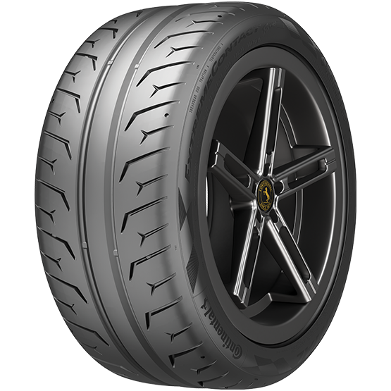 A car tire mounted on a black alloy wheel with a five-spoke design, featuring a gold emblem in the center.