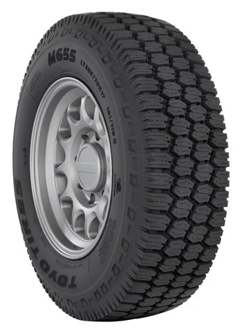 A Toyo open country M/T tire with a silver alloy rim.