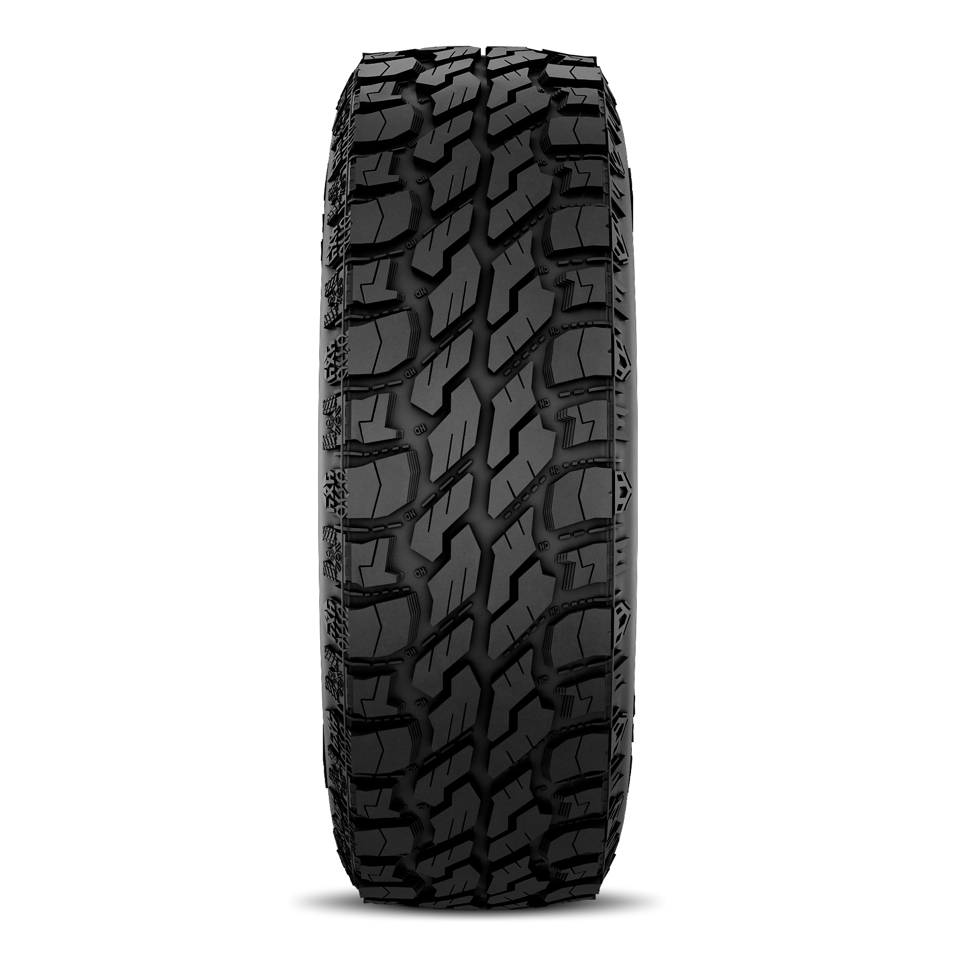Close-up of a rugged black tire with detailed tread pattern, isolated on black background.