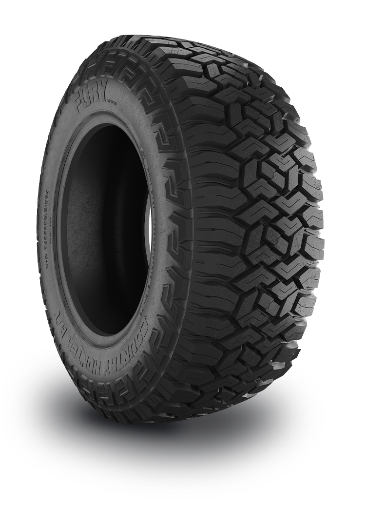 A rugged off-road tire with deep treads for off-road driving.