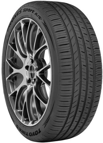 A Toyo Tires tire with a black alloy wheel, featuring multiple spokes and the brand name visible.