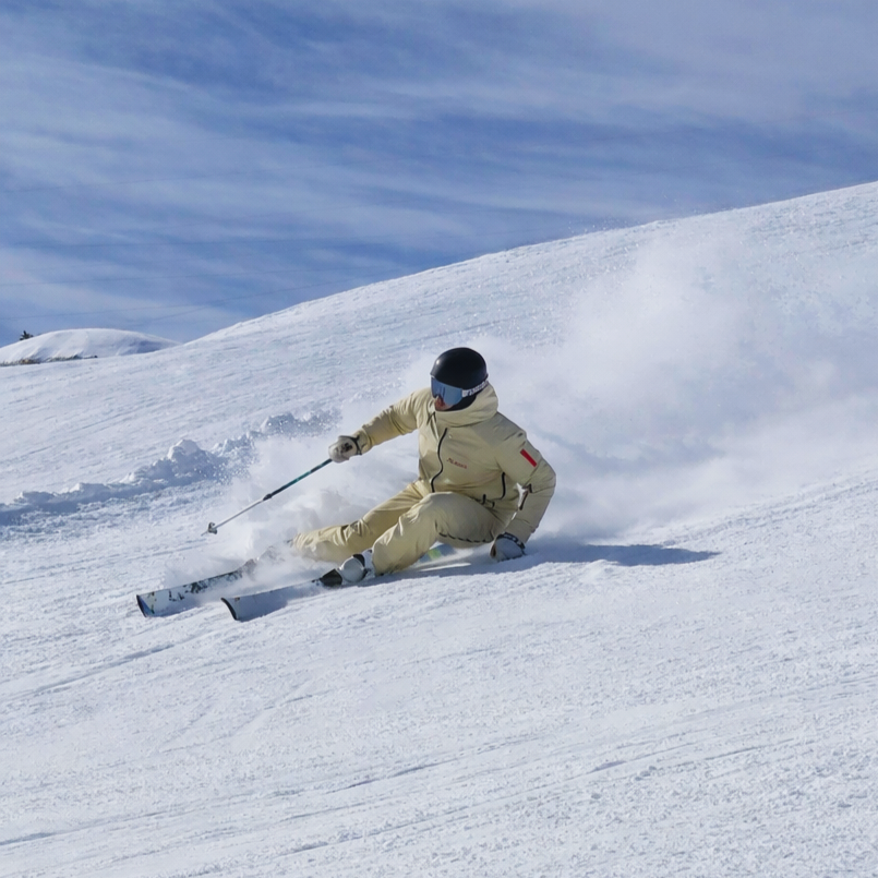 SkiHQ Coach Ryan Kerr carving at high edge angles
